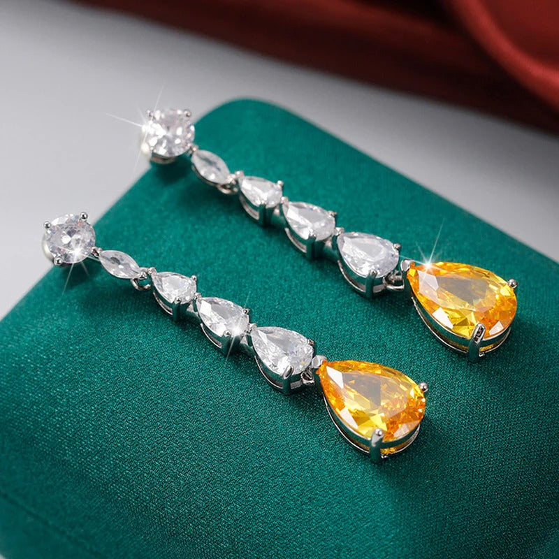Silver Plated Anti Tarnish American Diamond Studded Yellow Teardrop Shape Crushed Ice Cut Drop Earrings