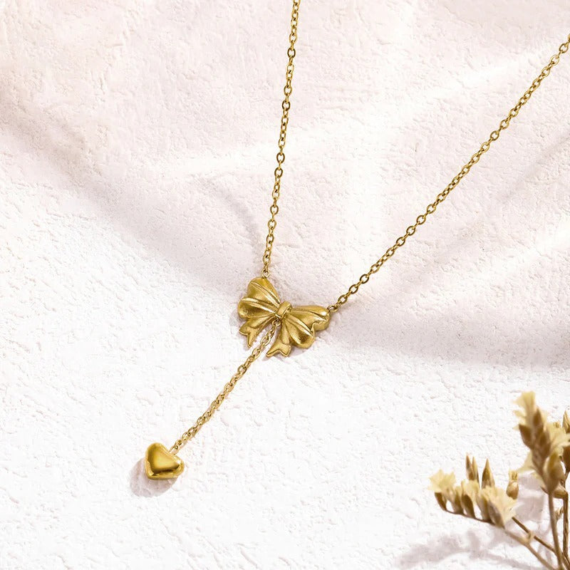 Gold Plated Stainless Steel Anti Tarnish Heart Themed Bow inspired Pendant Necklace