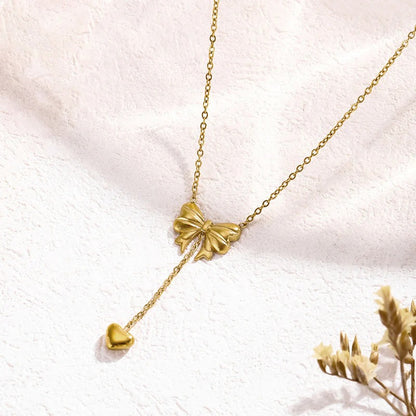 Gold Plated Stainless Steel Anti Tarnish Heart Themed Bow inspired Pendant Necklace
