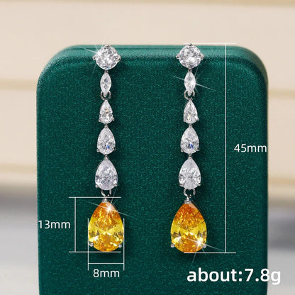 Silver Plated Anti Tarnish American Diamond Studded Yellow Teardrop Shape Crushed Ice Cut Drop Earrings